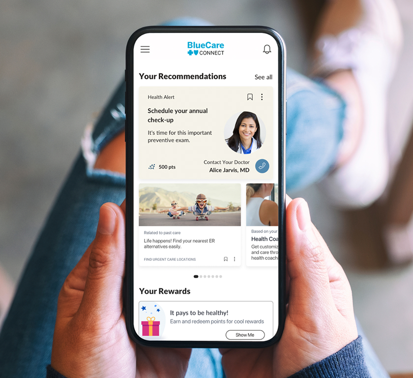 Photo of a person looking at the BlueCare Connect app on their smartphone